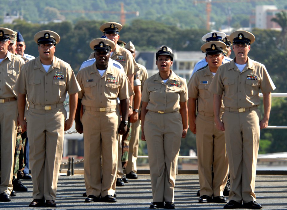 US Navy 070916-N-0194K-229 A group of newly pinned chief petty officers sing