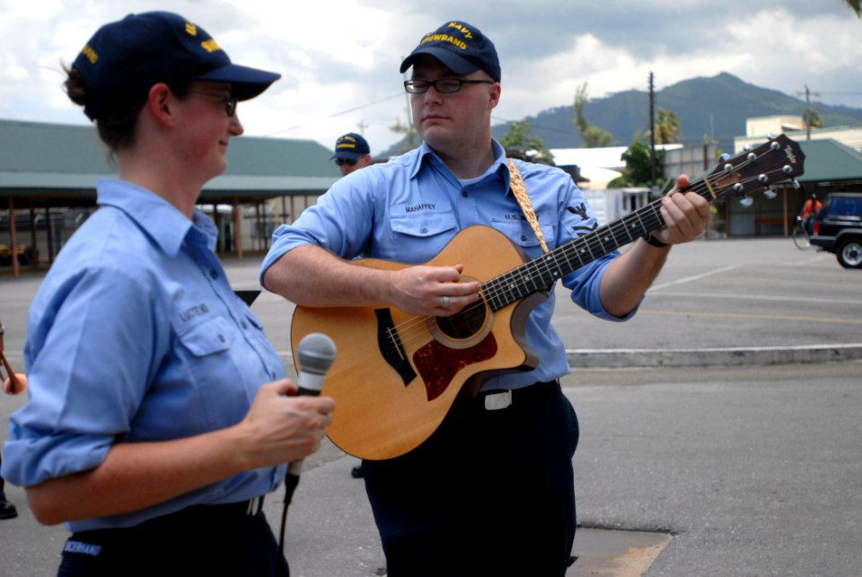 US Navy 070917-N-4238B-019 Sailors attached to the Military Sealift Command hospital ship USNS Comfort (T-AH 20) perform for a crowd in Port-of-Spain, Trinidad and Tobago