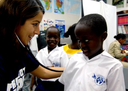 US Navy 070919-N-6278K-082 Karina Craine, a pediatrician and Project Hope volunteer attached to Military Sealift Command hospital ship USNS Comfort (T-AH 20) photo