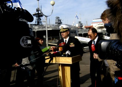 US Navy 070924-N-4649C-076 Cmdr. Marshall B. Brown, commanding officer of guided-missile destroyer USS Lassen (DDG 82), fields questions from the media