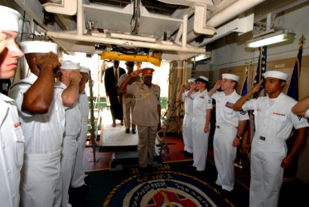 US Navy 070919-N-8704K-004 Brig. Gen. Edmund Dillon, chief of defense staff for Trinidad and Tobago Defense Force, is saluted by sideboys aboard Military Sealift Command hospital ship USNS Comfort (T-AH 20) photo