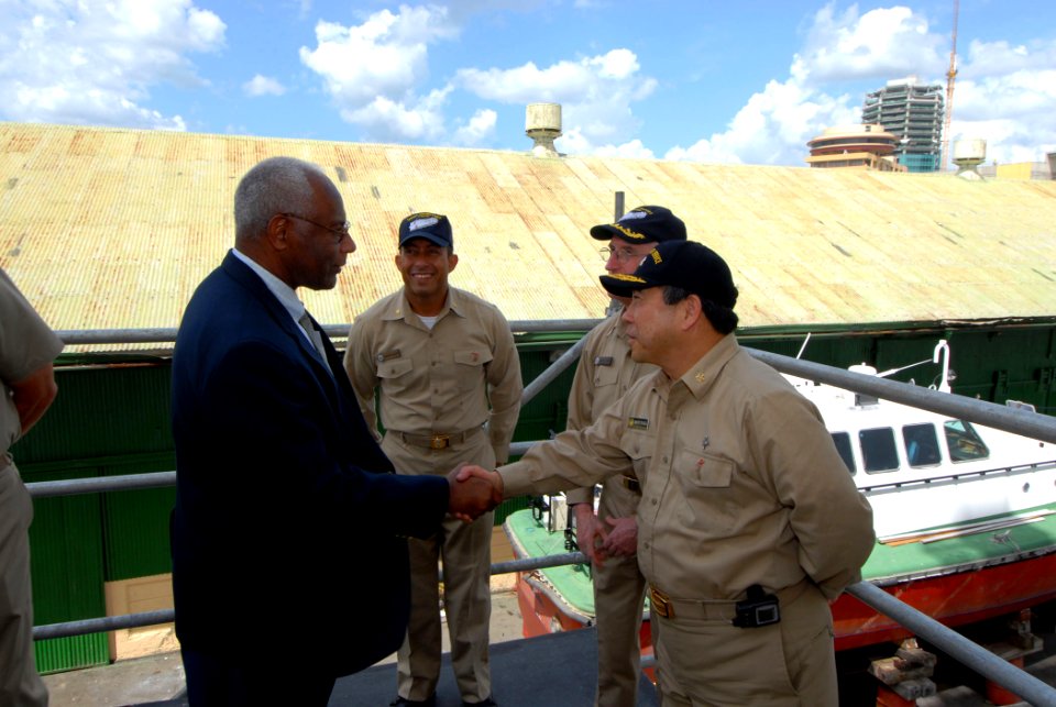 US Navy 070920-N-8704K-114 U.S. Public Health Service Rear Adm. Kenneth Moritsugu, acting U.S. surgeon general, greets Dr. Roy Austin, U.S. ambassador