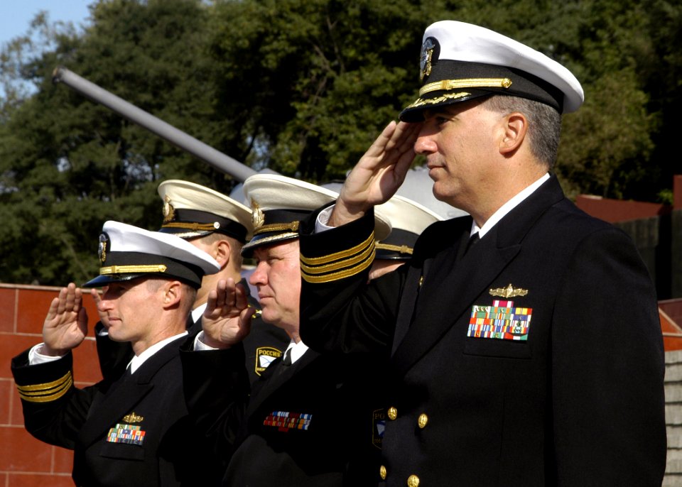 US Navy 070925-N-4649C-034 Cmdr. Marshall B. Brown, commanding officer of Arleigh Burke-class guided-missile destroyer USS Lassen (DDG 82), salutes as the national anthem is played during a wreath laying ceremony