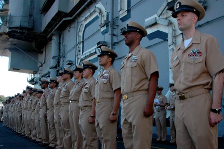 US Navy 070921-N-3136P-096 New chief petty officers stand in formation during their pinning ceremony aboard the USS Kitty Hawk (CV 63)
