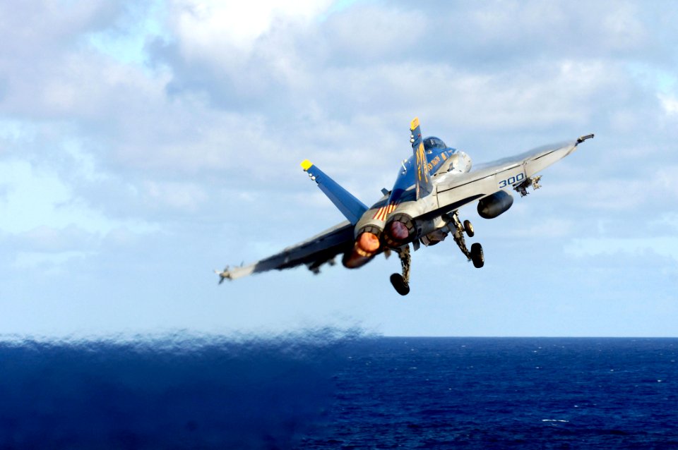 US Navy 070919-N-7883G-022 An F-A-18C Hornet from the Golden Dragons of Strike Fighter Squadron (VFA) 192 launches from the flight deck aboard USS Kitty Hawk (CV 63)