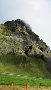 Clouds green grass photo