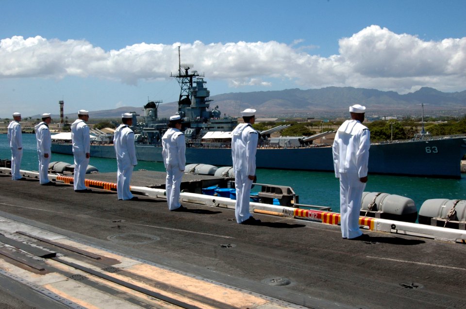 US Navy 070922-N-7128A-010 Sailors man the rails as nuclear-powered aircraft carrier USS Nimitz (CVN 68) passes the battleship USS Missouri (BB 63). Nimitz made a two-day visit to embark guests for a Tiger Cruise to San Diego