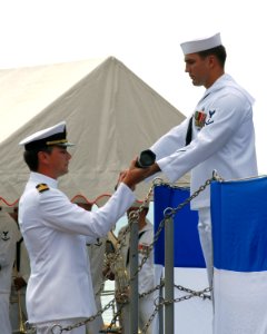 US Navy 070926-N-6936D-064 Chief Mate William Woodman, attached to Military Sealift Command (MSC), relieves Navy Diver 2nd Class Ryan S. Steinkamp of the watch during the decommissioning ceremony