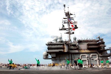 US Navy 070923-N-3136P-014 During a Friends and Family Day cruise aboard USS Kitty Hawk (CV 63), Sailors demonstrate a no-load test on an aircraft catapult