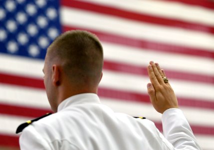 US Navy 070921-N-5328N-701 Officer Candidate School Class 20-07, the last class of officer candidates to graduate from Officer Training Command Pensacola, receive their commission during a ceremony held at the National Museum o