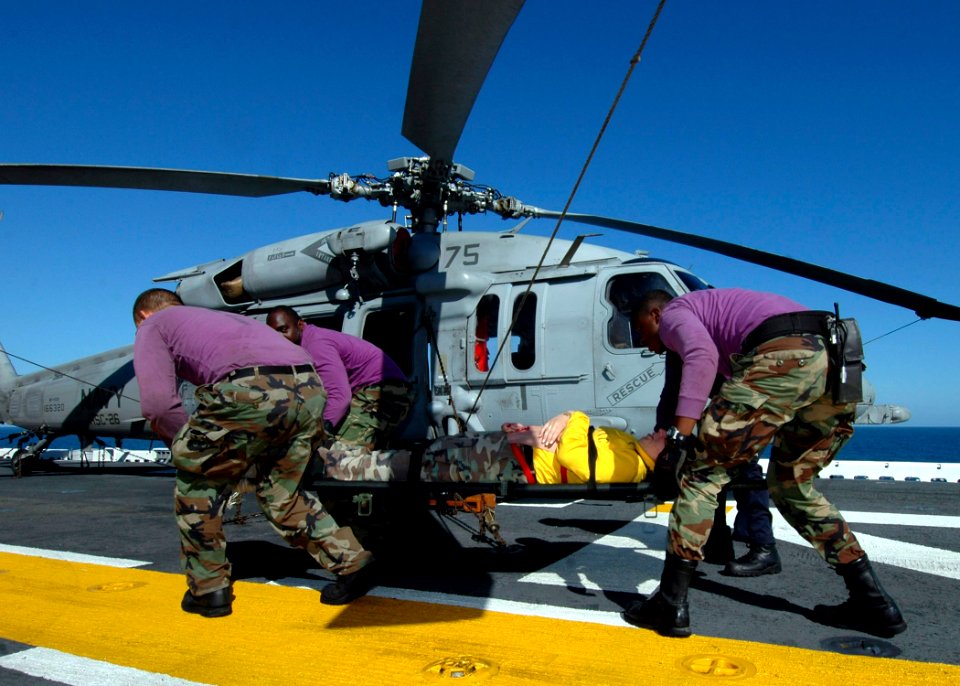 US Navy 070925-N-4856C-019 Sailors participate in a mass casualty drill on the flight deck of amphibious assault ship USS Iwo Jima (LHD 7)