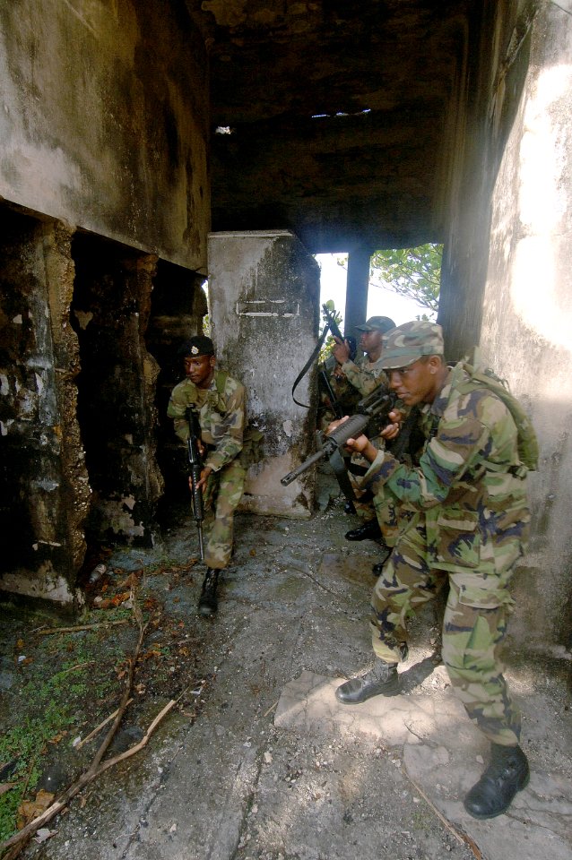 US Navy 070925-N-0989H-455 Members of the Jamaica Defense Force conduct Close Quarters Battle and room clearing drills with U.S. Marines assigned to a mobile training team during small unit training