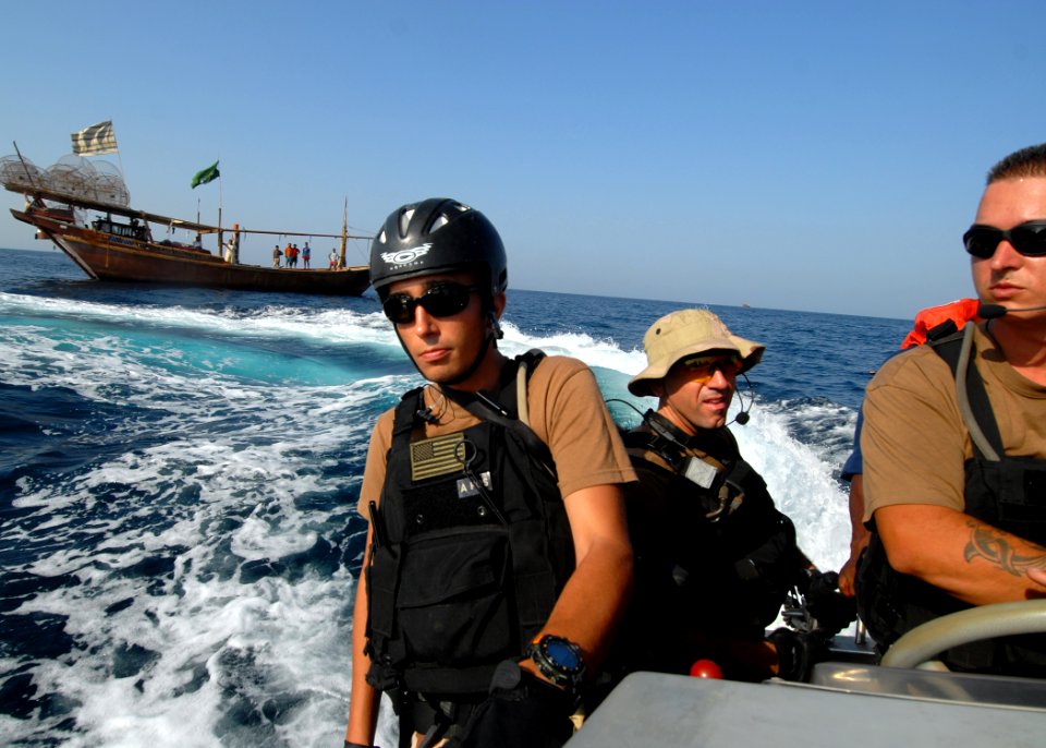US Navy 070926-N-0841E-039 Boarding team members from guided-missile frigate USS Carr (FFG 52) transit back to the ship after rendering assistance to a United Arab Emirates-flagged fishing dhow
