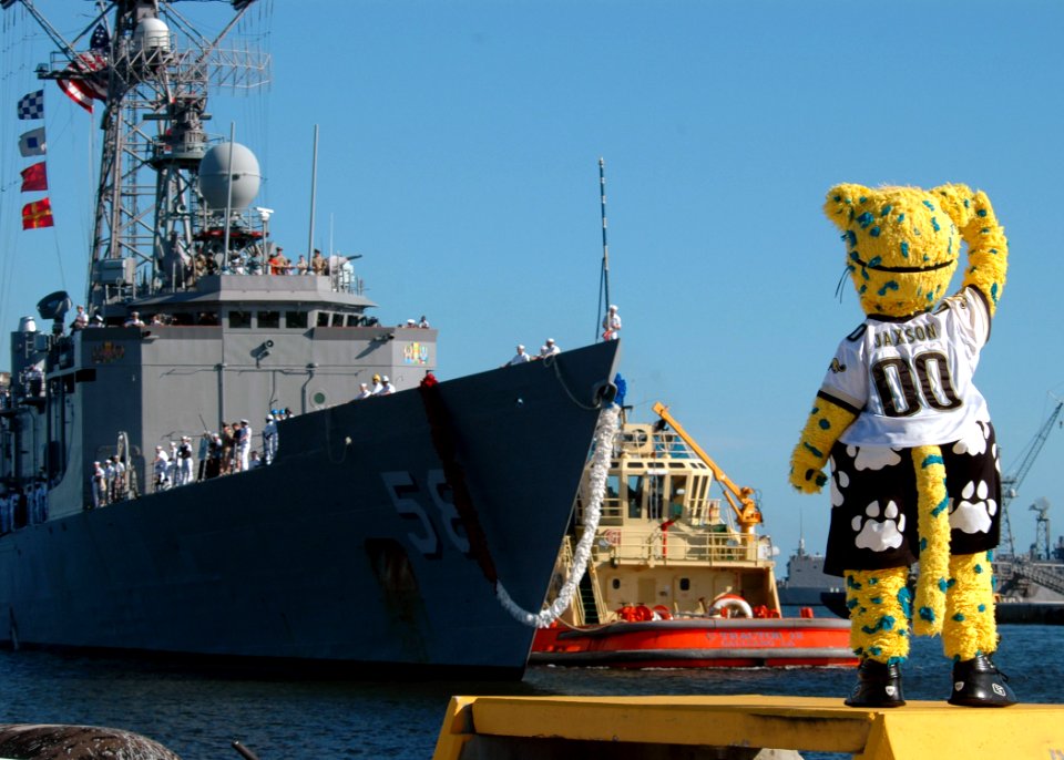 US Navy 070926-N-1522S-005 Jacksonville Jaguars mascot Jaxon Deville salutes Sailors aboard guided-missile frigate USS Samuel B. Roberts (FFG 58) as the ship returns to Naval Station Mayport