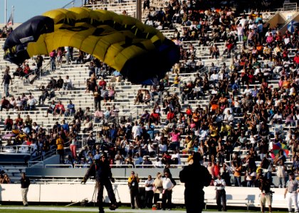 US Navy 070929-N-5208T-005 A member of the U.S. Navy Parachute Demonstration Team, the Leap Frogs, jumps into the Cotton Bowl as part of Dallas Navy Week photo