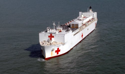 US Navy 070926-N-7088A-016 Military Sealift Command Hospital ship USNS Comfort (T-AH 20) is at anchor several miles off the coast of Georgetown, Guyana photo