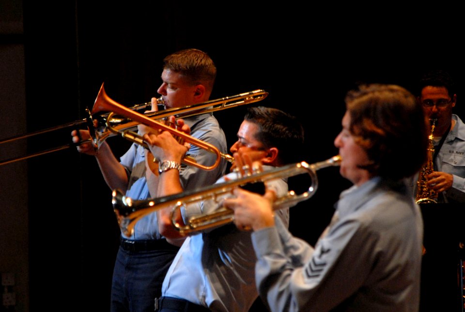 US Navy 070929-N-7092S-105 From left, U.S. Navy Showband members Musician 1st Class Joe Davidson, Musician 2nd Class Brandon Barbee and Musician 1st Class Amanda Marquis perform at the National Cultural Centre
