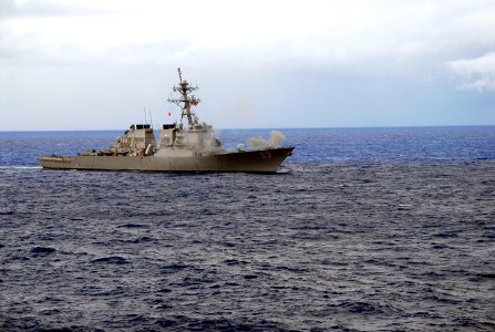 US Navy 070927-N-0890S-046 Guided-missile destroyer USS John Paul Jones (DDG 53), assigned to Nimitz Carrier Strike Group, fires her five-inch MK-45 54-caliber lightweight gun during a sea power demonstration