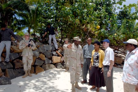 US Navy 070930-F-9074R-104 A group observes the work done by a U.S. Navy Mobile Construction Battalion during a tour of the Combined Joint Task Force-Horn of Africa project