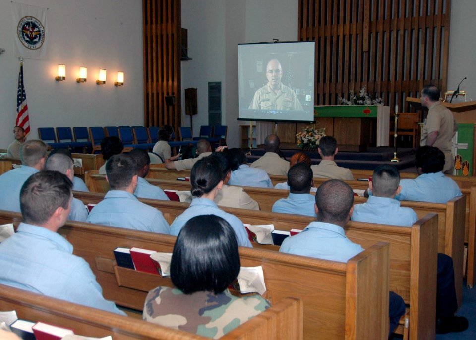 US Navy 070927-N-1522S-001 Sailors listen to a taped video presentation from Chief of Naval Personnel Vice Adm. John Harvey Jr. at the Task Force Life Work Roadshow held on board Naval Station Mayport