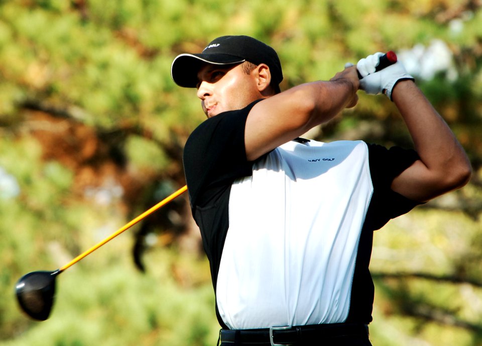 US Navy 070926-N-5330L-389 Lt. Antonio Mauro, a member of the U.S. Navy Golf Team, drives a ball down the fairway during the U.S. Armed Forces Golf Championship at the Aeropines Golf Course on board Naval Air Station Oceana