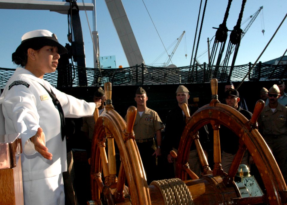 US Navy 070929-N-2893B-001 Airman Priscila Carmona discusses the history of USS Constitution with members of the Navy's Senior Enlisted Academy during a special tour