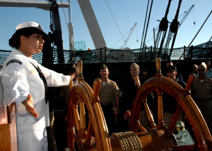 US Navy 070929-N-2893B-001 Airman Priscila Carmona discusses the history of USS Constitution with members of the Navy's Senior Enlisted Academy during a special tour