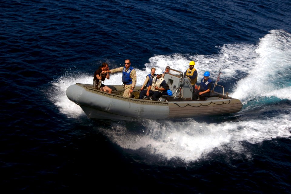 US Navy 070927-N-4014G-205 A rigid hull inflatable boat from guided-missile destroyer USS Porter (DDG 78) returns to the ship with personnel from guided-missile destroyer USS James E. Williams (DDG 95)