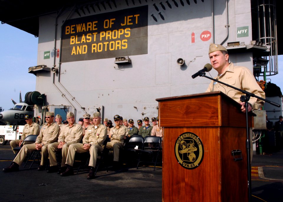 US Navy 071001-N-5928K-004 Cmdr. James Linns, commanding officer of Electronic Attack Squadron (VAQ) 137, addresses squadron Sailors during his change of command ceremony on the flight deck of nuclear-powered aircraft carrier U