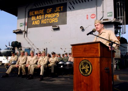 US Navy 071001-N-5928K-004 Cmdr. James Linns, commanding officer of Electronic Attack Squadron (VAQ) 137, addresses squadron Sailors during his change of command ceremony on the flight deck of nuclear-powered aircraft carrier U