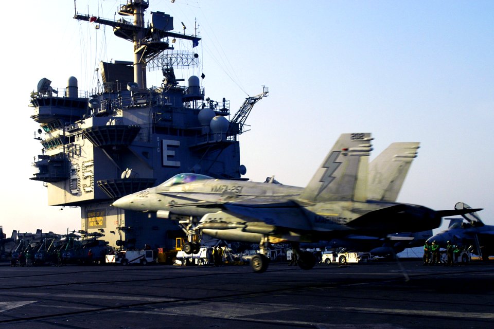 US Navy 071005-N-5681S-098 An F-A-18C Hornet attached to the Thunderbolts of Marine Fighter Attack Squadron (VMFA) 251, makes an arrested landing on the flight deck aboard the nuclear-powered aircraft carrier USS Enterprise (CV