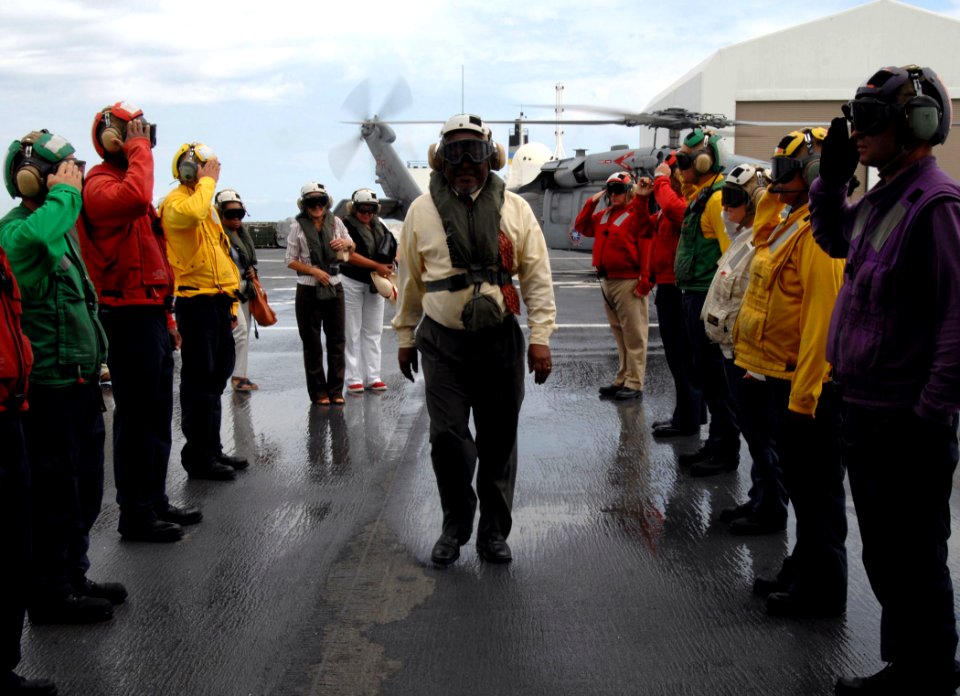 US Navy 070928-N-7088A-018 Guyana's Prime Minister Samuel Hinds is saluted by sideboys as he arrives for a tour of Military Sealift Command hospital ship USNS Comfort (T-AH 20)