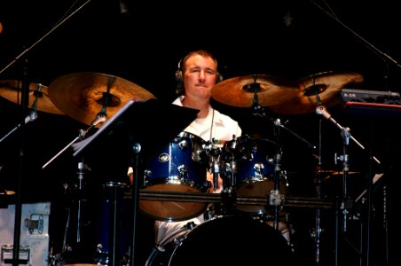 US Navy 071002-N-7163S-002 Chief Musician Steve Crady, a member of the Navy Band Great Lakes Horizon solos on the drums during a performance at Harding High School photo