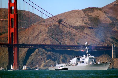US Navy 071006-N-0649J-006 The guided missile destroyer USS Shoup (DDG 86) passes under the Golden Gate Bridge as part of the Parade of Ships during the 27th annual San Francisco Fleet Week celebration photo