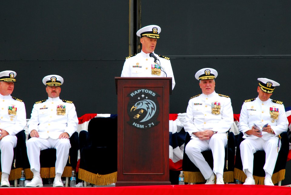 US Navy 071004-N-4995K-041 Cmdr. Michael Nortier, commanding officer of Helicopter Maritime Strike Squadron (HSM) 71, talks about the future of his squadron during its establishment ceremony