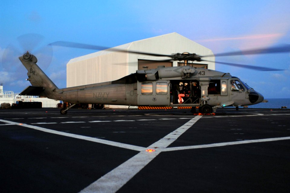 US Navy 071007-N-7088A-077 The last patients to receive care aboard the Military Sealift Command hospital ship USNS Comfort (T-AH 20), board an MH-60S helicopter in preparation to depart the ship