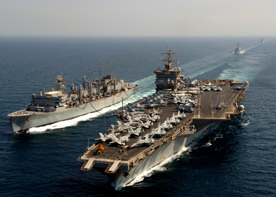 US Navy 071004-N-5928K-005 Nuclear-powered aircraft carrier USS Enterprise (CVN 65) conducts an underway replenishment with Military Sealift Command fast combat support ship USNS Supply (T-AOE 6)