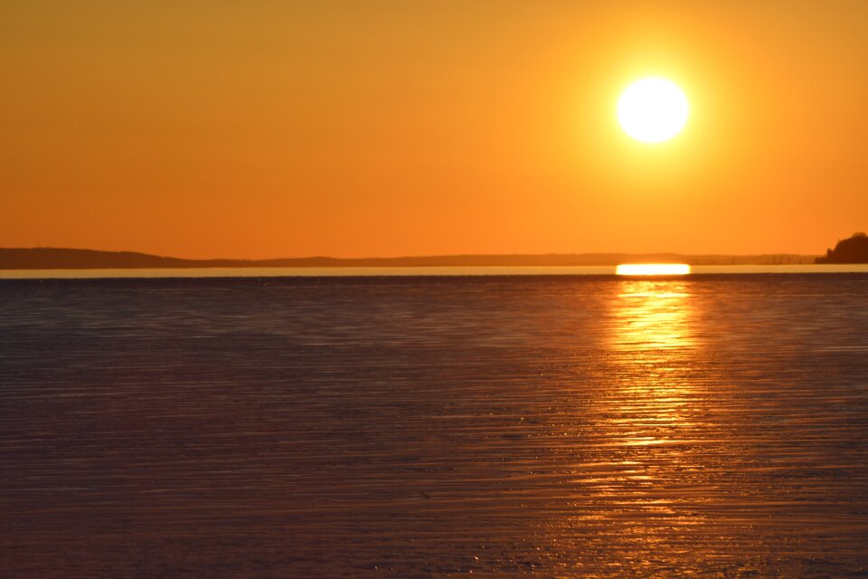 Sun dawn body of water