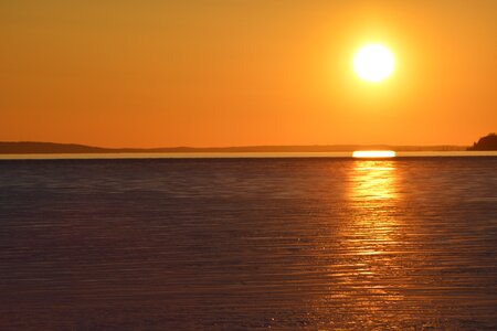 Sun dawn body of water photo