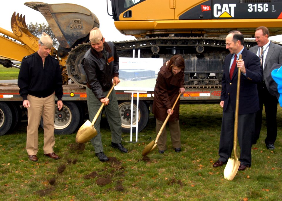 US Navy 071031-N-9860Y-005 Leaders from Naval Air Station Whidbey Island, the Oak Harbor community, and the Boeing Company use ceremonial gold shovels to dig the first holes for a groundbreaking ceremony for the Growler Support