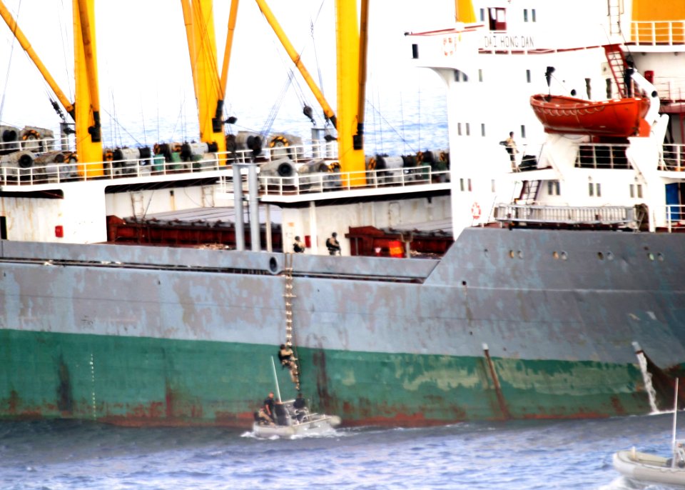 US Navy 071030-N-0000X-070 Boarding team members from guided-missile destroyer USS James E. Williams (DDG 95) board North Korean cargo vessel Dai Hong Dan to provide medical assistance