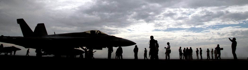 US Navy 071027-N-1229B-079 An F-A-18E Super Hornet, assigned to the Kestrels of Strike Fighter Squadron (VFA) 137, is directed to launch off Nimitz-class aircraft carrier USS Abraham Lincoln (CVN 72) photo