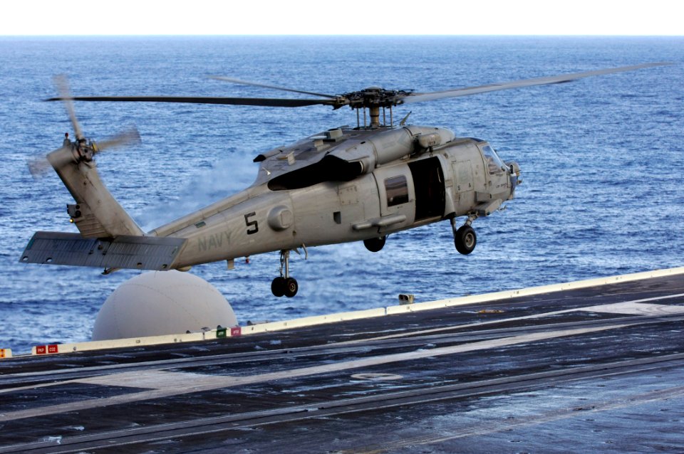 US Navy 071031-N-7883G-001 An HH-60H Seahawk, assigned to the Chargers of Helicopter Anti-Submarine Squadron (HS) 14, lifts off from the flight deck of USS Kitty Hawk (CV 63)