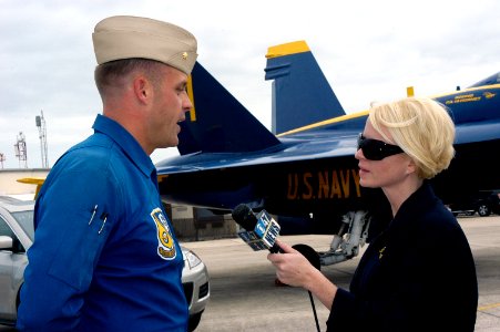 US Navy 071031-N-8102J-043 CBS television reporter Celine McArthur interviews Blue Angel's pilot Marine Corps Maj. Nathan Miller, ^7 pilot of the Blue Angels, prior to her media ride in a Blue Angels F-A-18 Hornet