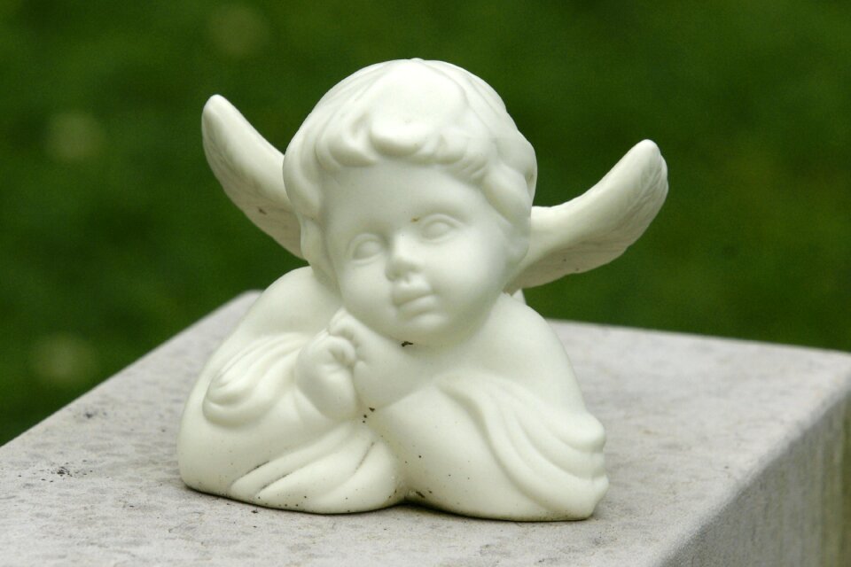 Guardian angel sculpture symbol