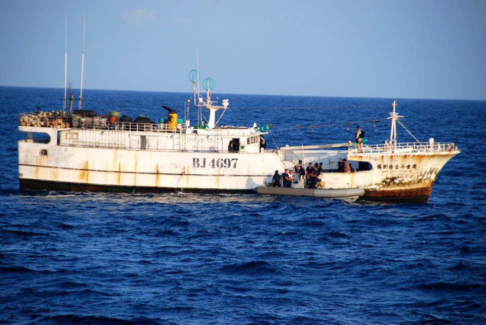 US Navy 071105-N-0000X-007 Members of a U.S. Navy rescue and assistance team provide humanitarian and medical assistance to the crew of the Taiwanese-flagged fishing trawler Ching Fong Hwa