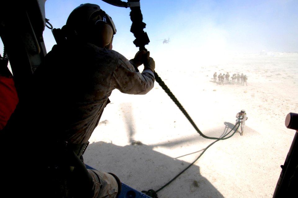 US Navy 071105-N-7027P-143 Marines attached to 4th Platoon, 2nd Fleet Anti-terrorism Security Team (FAST), practice fast roping out of a MH-60S Seahawk, assigned to Helicopter Sea Combat Squadron (HSC) 28, during a crisis respo