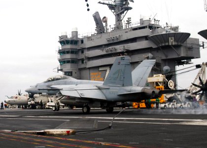 US Navy 071105-N-1229B-061 An F-A-18F Super Hornet, attached to the Bounty Hunters of Strike Fighter Squadron (VFA) 2, makes an arrested landing aboard Nimitz-class aircraft carrier USS Abraham Lincoln (CVN 72) photo