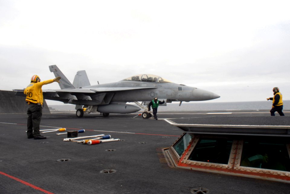 US Navy 071106-N-1635S-003 An F-A-18F Super Hornet, assigned to the Black Knights of Strike Fighter Squadron (VFA) 154, prepares to launch from the flight deck of Nimitz-class aircraft carrier USS Ronald Reagan (CVN 76)