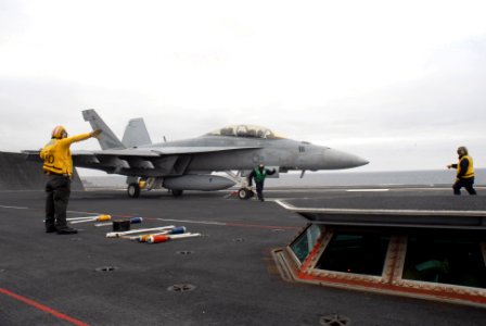 US Navy 071106-N-1635S-003 An F-A-18F Super Hornet, assigned to the Black Knights of Strike Fighter Squadron (VFA) 154, prepares to launch from the flight deck of Nimitz-class aircraft carrier USS Ronald Reagan (CVN 76)